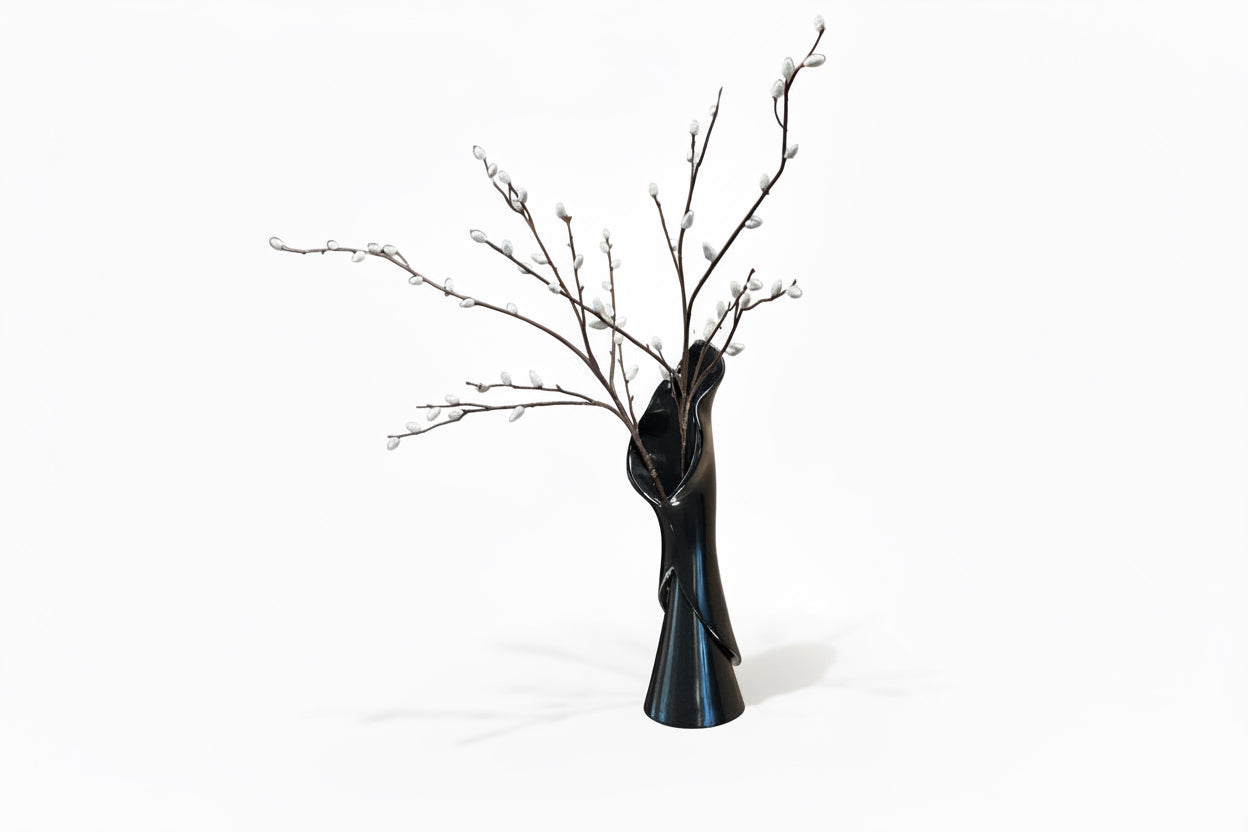 Elegant Tulip Ceramic Vase by The Vault Creative with a smooth, glossy finish and a classic tulip shape for floral displays.