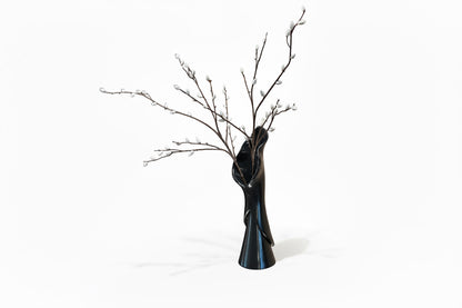 Elegant Tulip Ceramic Vase by The Vault Creative with a smooth, glossy finish and a classic tulip shape for floral displays.