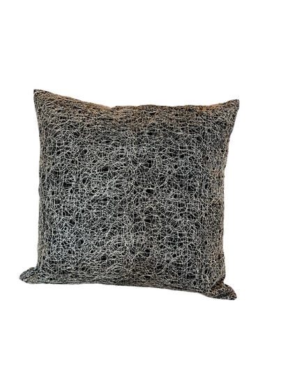 Silver and black metallic pillow from The Vault Creative, featuring a plush, shiny fabric with stylish design elements.