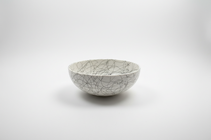 Vintage McM bowl by Stone Textile Studio, showcasing intricate patterns and rustic ceramic design.