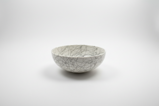 Vintage McM bowl by Stone Textile Studio, showcasing intricate patterns and rustic ceramic design.