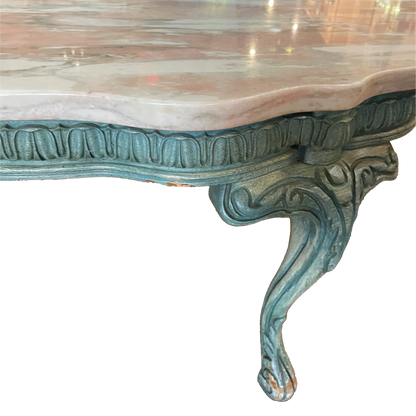 Pink marble coffee table by Ozmun Home with sleek modern design and rounded edges, perfect for contemporary living rooms.