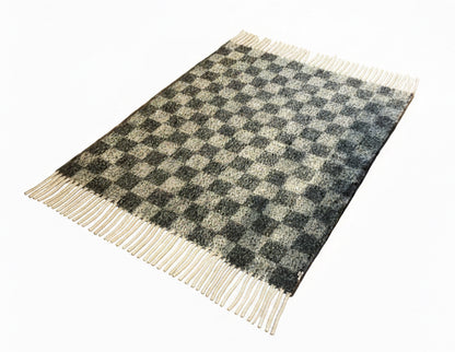 French Cozy Chunky Checkered Throw blanket by The Vault Creative, featuring a soft, chunky checkered pattern in warm tones.