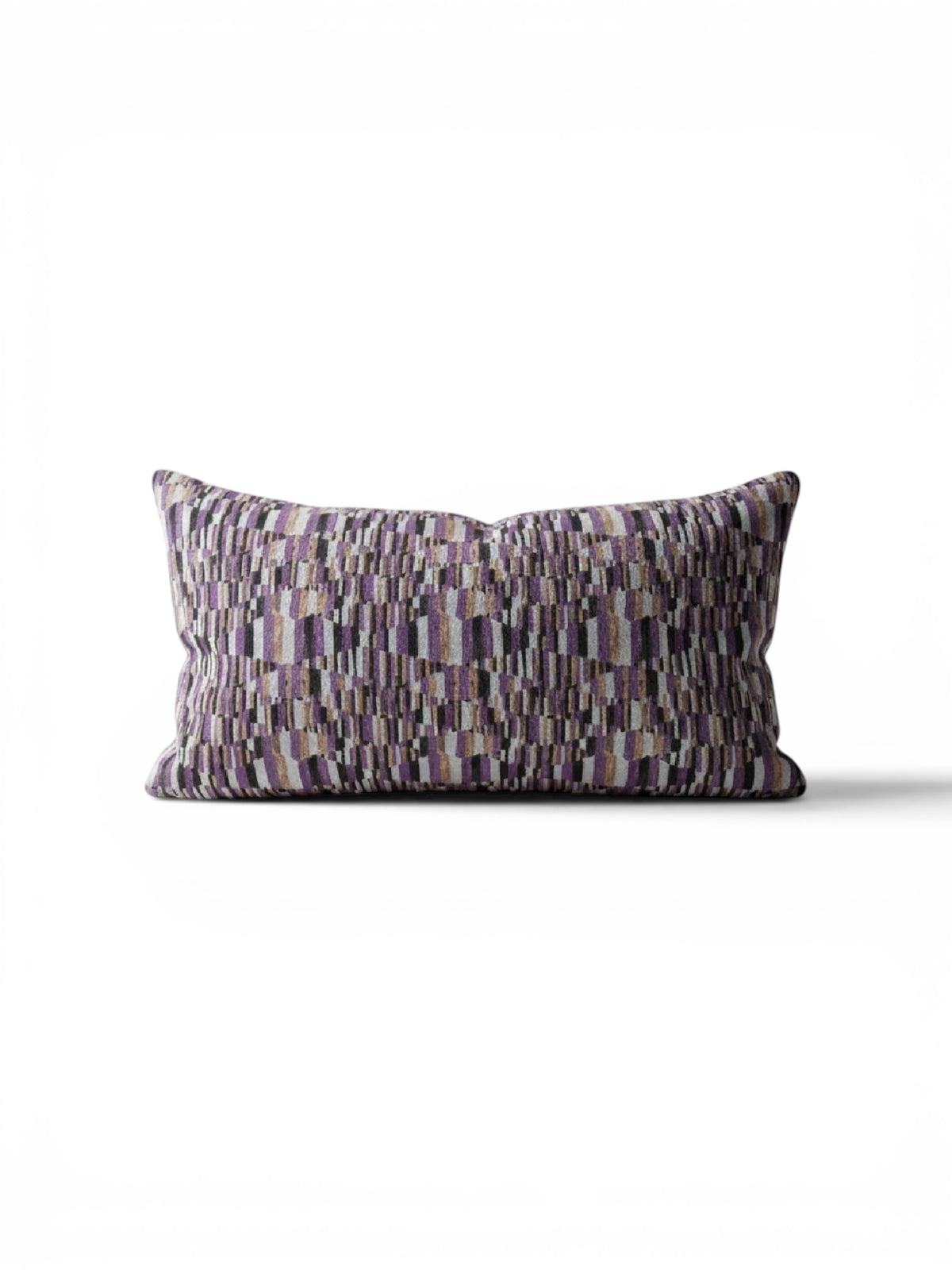 Small lumbar pillow by Stone Textile featuring soft fabric and ergonomic design for back support and comfort.