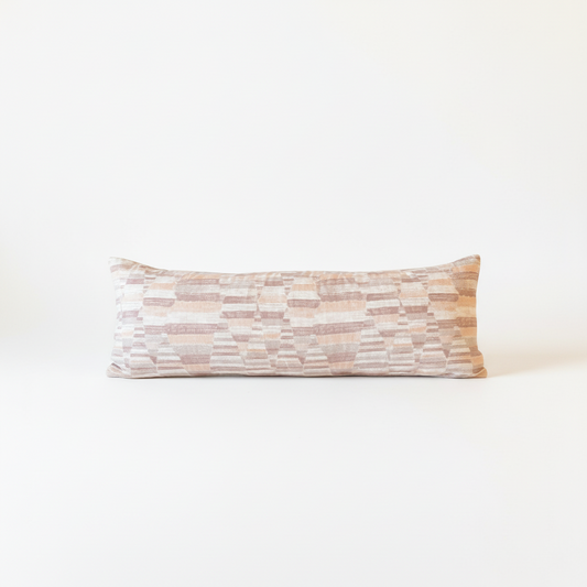 Large lumbar pillow by Stone Textile with soft fabric cover, designed for comfortable back support.