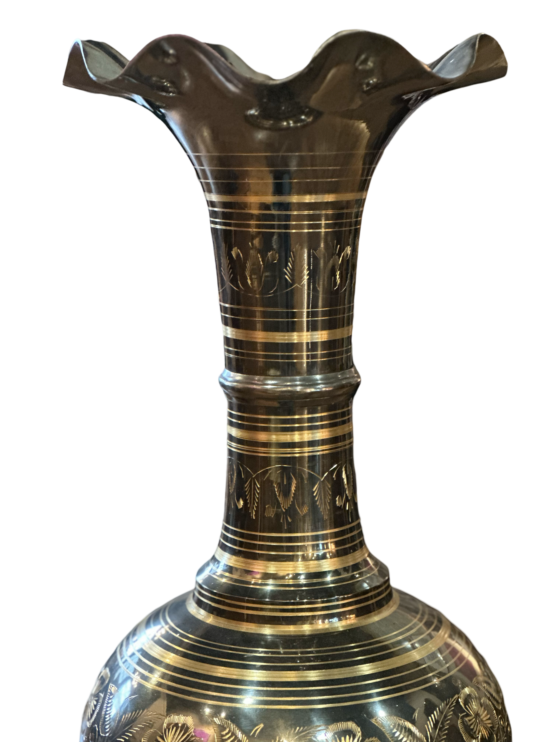Large vintage Indian vase with intricate patterns and earthy tones, crafted by The Vault Creative.