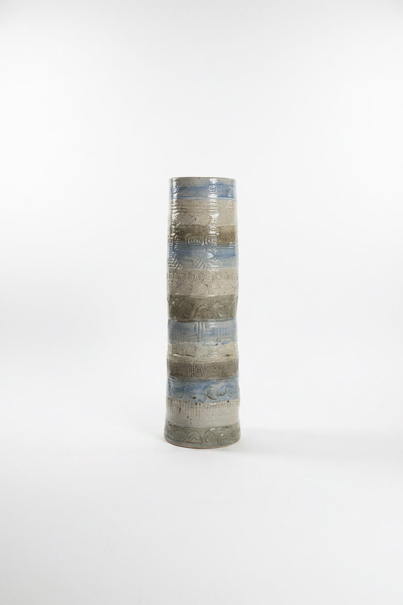 Tall ceramic decorative vessel by The Vault Creative, featuring a sleek, minimalist design suitable for modern home decor.