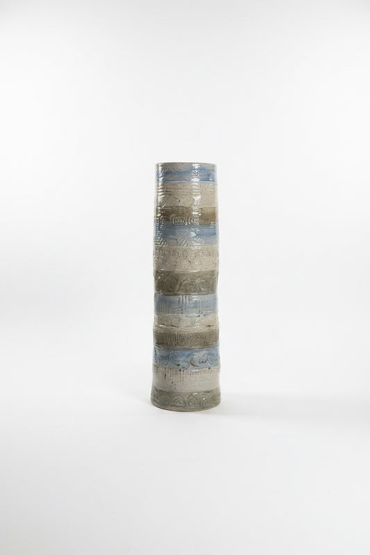 Tall ceramic decorative vessel by The Vault Creative, featuring a sleek, minimalist design suitable for modern home decor.