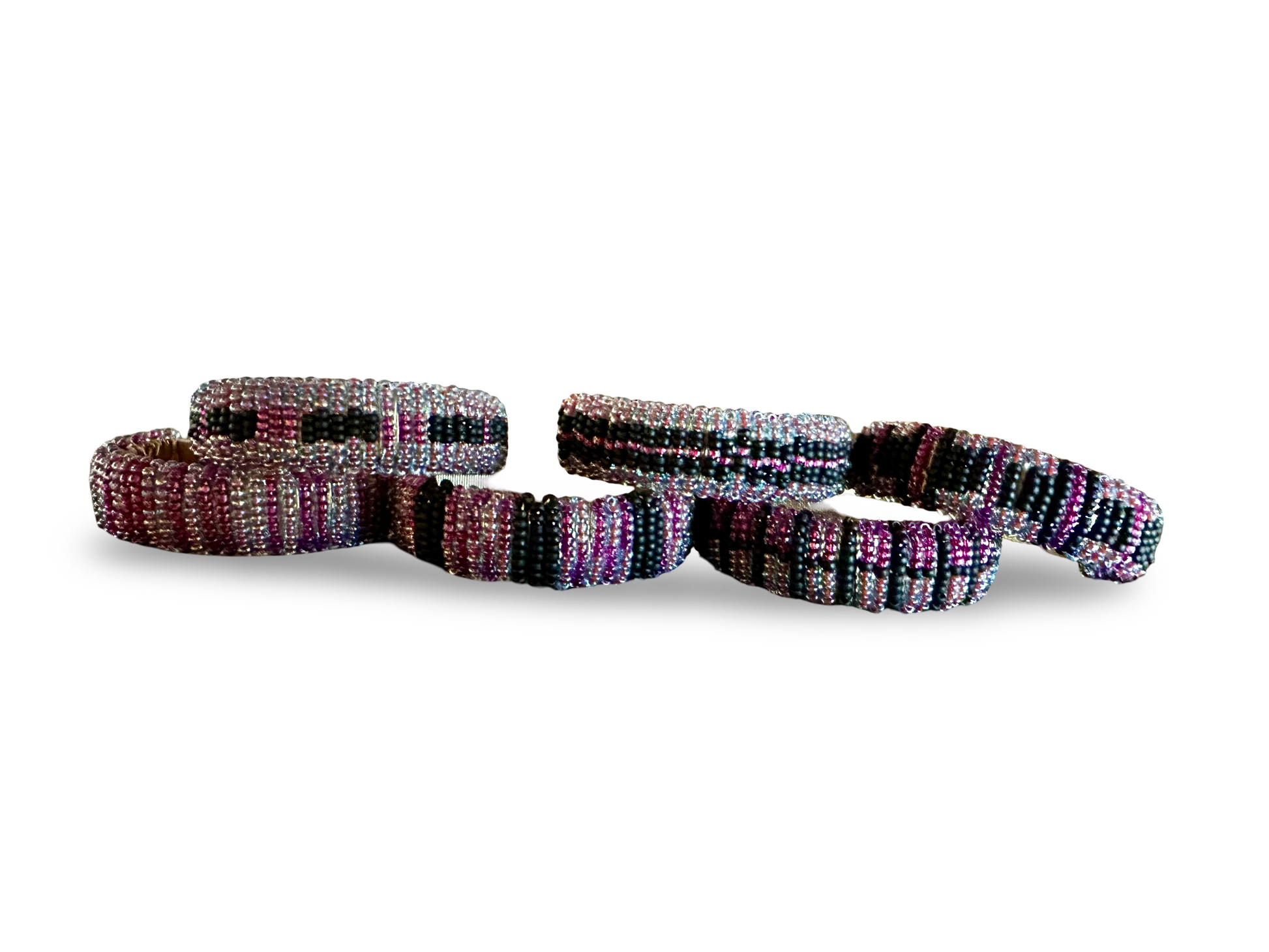 Set of six beaded napkin rings from The Vault Creative, featuring colorful beaded designs for elegant table settings.