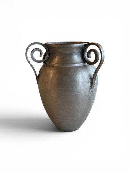 Cast metal urn vase by Ozmun Home featuring a sleek, modern design with a smooth finish, ideal for decorative or floral arrangements.