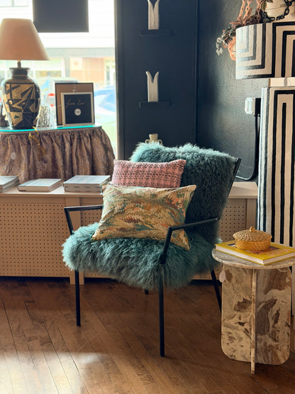 Curly Lamb Chair by The Vault Creative featuring plush curly lamb upholstery and a modern, stylish design.