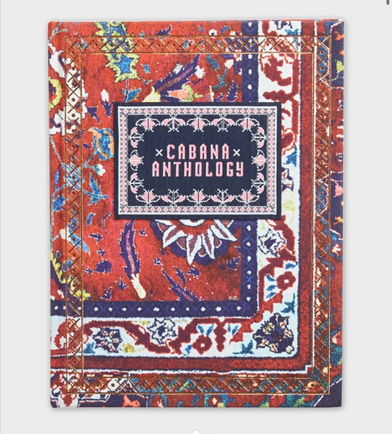 Cabana Anthology by The Vault Creative, featuring vibrant fabric patterns and colorful design elements on a stylish cabana umbrella.
