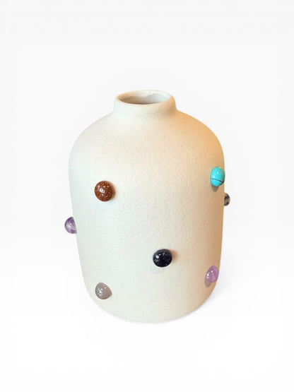 Phoebe P. Grunsfeld June Bud Vase featuring a sleek ceramic design with a narrow opening, perfect for small floral arrangements.