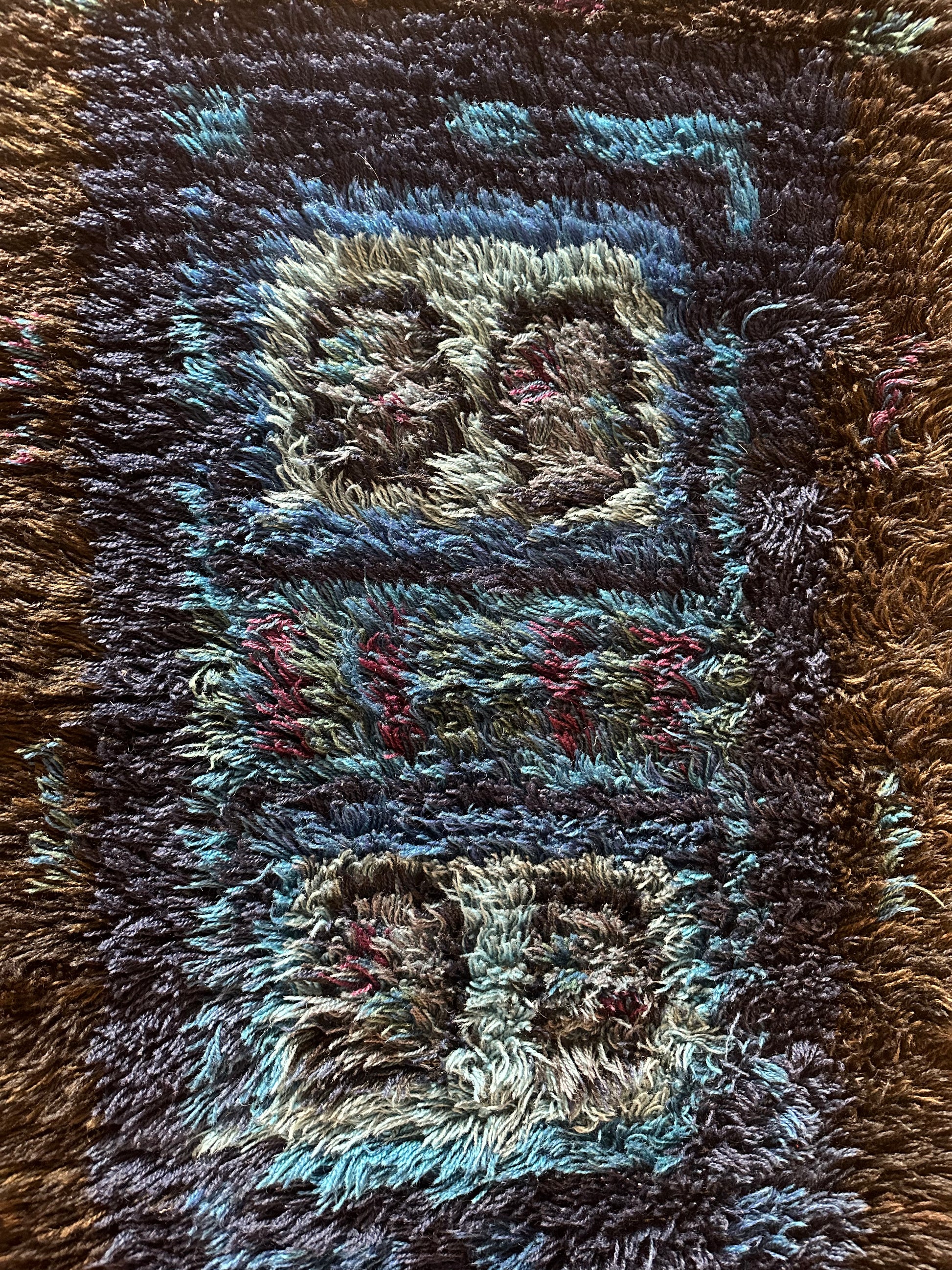 Mid-century shag rug by Ozmun Home with plush, textured fibers in a stylish design, ideal for modern living spaces.