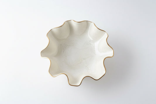 Big cream gemstone resin bowl by The Vault Creative, showcasing a smooth, rounded design with a glossy finish.
