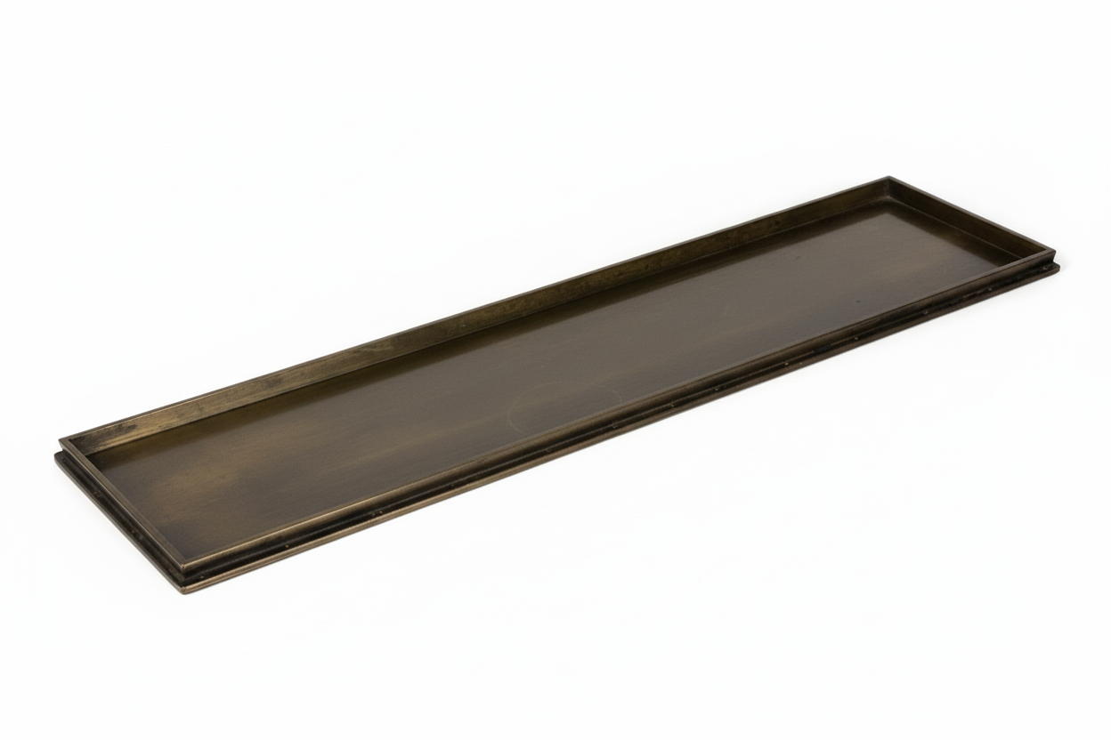 Rectangular brass tray by The Vault Creative with a polished finish, showcasing a sleek and modern design for home decor.