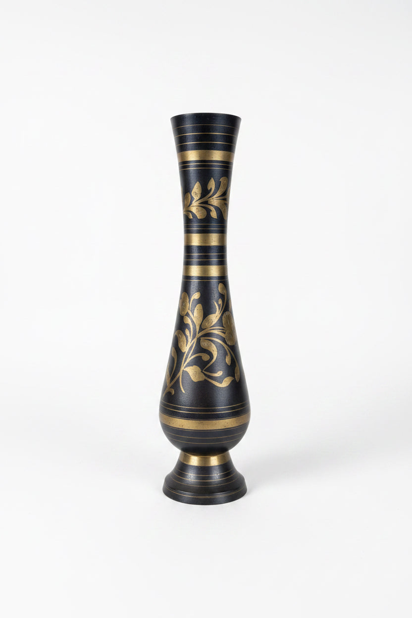 Vintage brass floral vase with intricate floral patterns, crafted by The Vault Creative, showcasing a classic and elegant design.