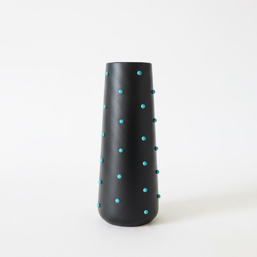 P. Grunsfeld Studded 10-inch ceramic vase by The Vault Creative with textured, studded surface in neutral tones.