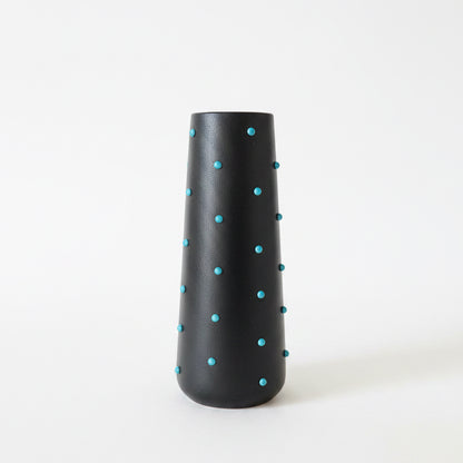 P. Grunsfeld Studded 10-inch ceramic vase by The Vault Creative with textured, studded surface in neutral tones.