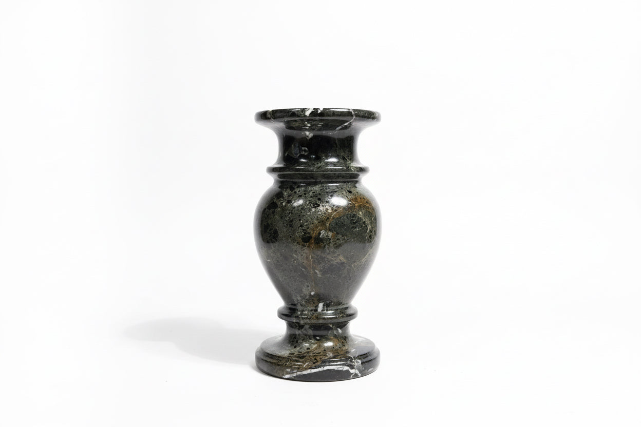 Vintage black marble vase by Stone Textile Studio with smooth, polished surface and classic cylindrical shape.