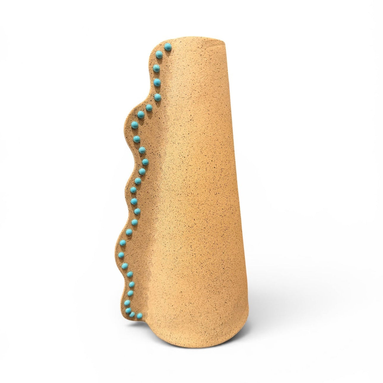 Ceramic Wavy Vase by P. Grunsfeld from The Vault Creative, featuring a glossy, flowing design in neutral tones.
