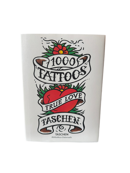 Ozmun Home 1000 Tattoos book featuring a variety of tattoo designs in a compact book format.