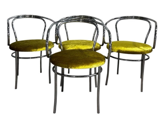 Set of four chrome Thonet chairs by Ozmun Home with sleek, modern design and curved wooden seats.