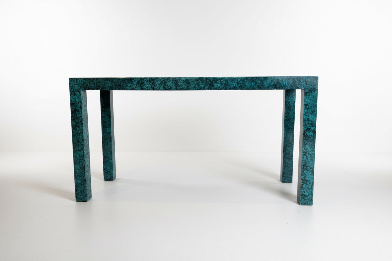 Faux malachite console table by The Vault Creative with sleek black legs and vibrant green malachite pattern surface.