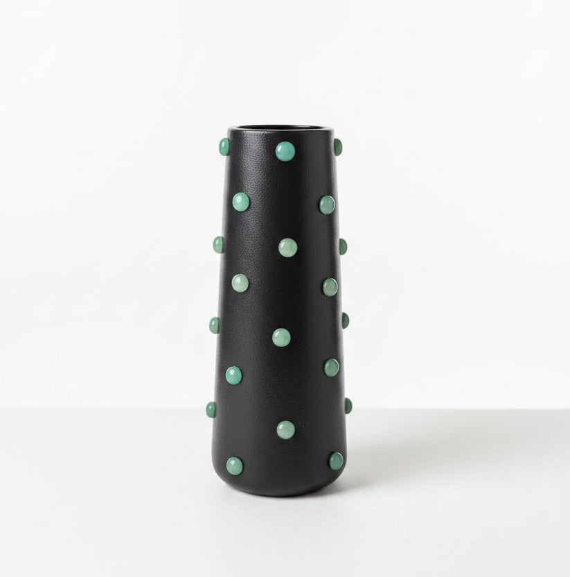 P. Grunsfeld studded 10-inch ceramic vase by The Vault Creative, with textured surface and decorative studs, in a neutral color.