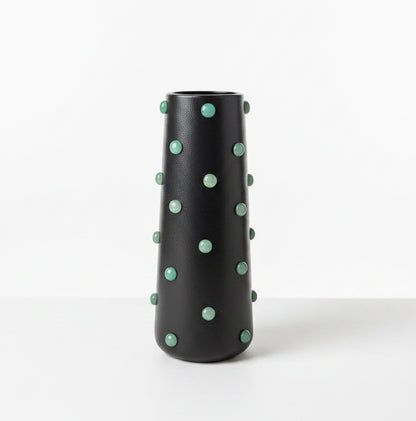 P. Grunsfeld studded 10-inch ceramic vase by The Vault Creative, with textured surface and decorative studs, in a neutral color.