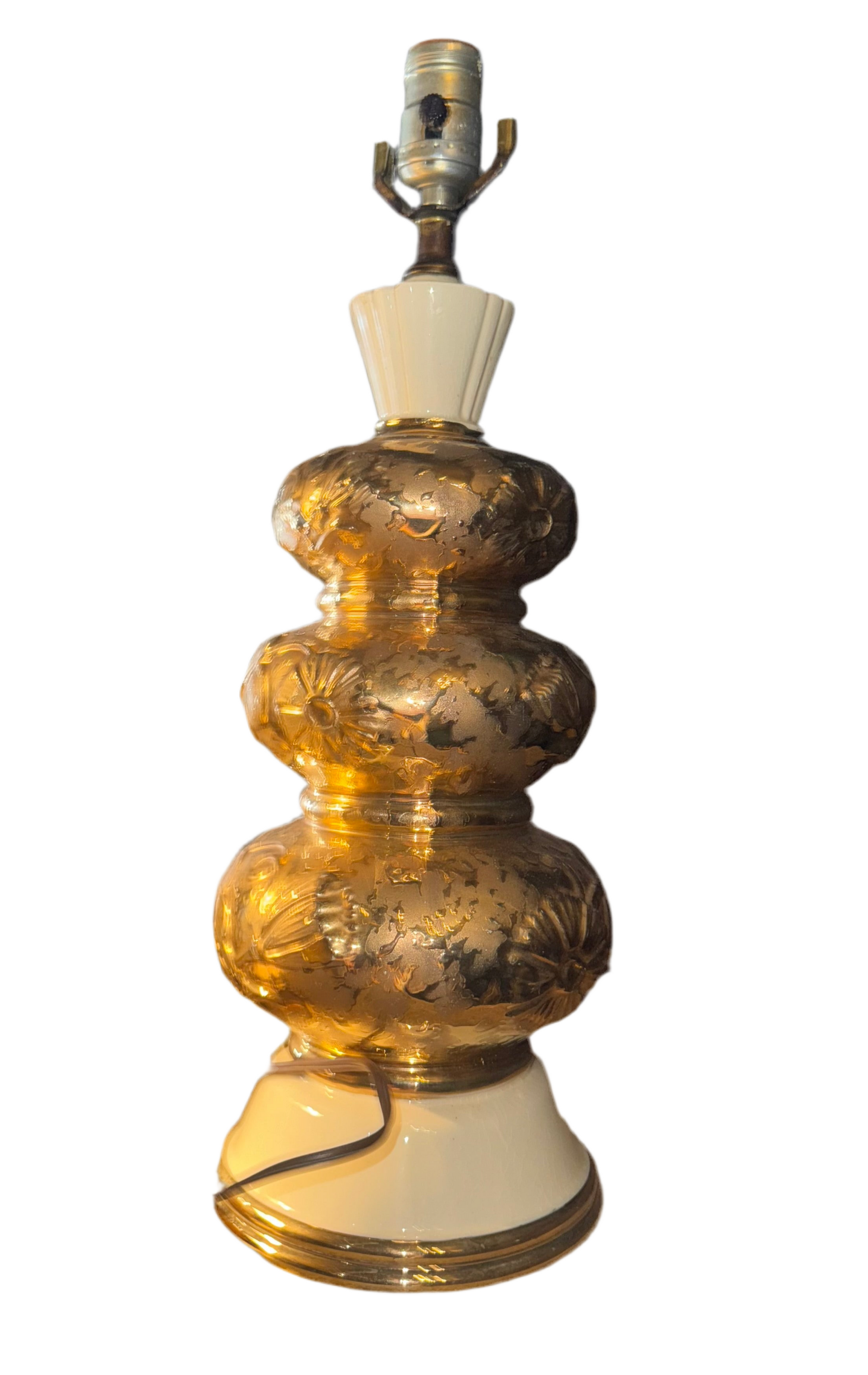 Pair of gold gilt lamps by Ozmun Home with ornate bases and elegant shades, perfect for classic or vintage decor.