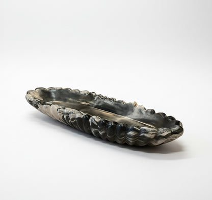 Handmade Forma XXL concrete bowl by Atelier La Rouleuse with dark marble finish, showcasing its textured modern design.