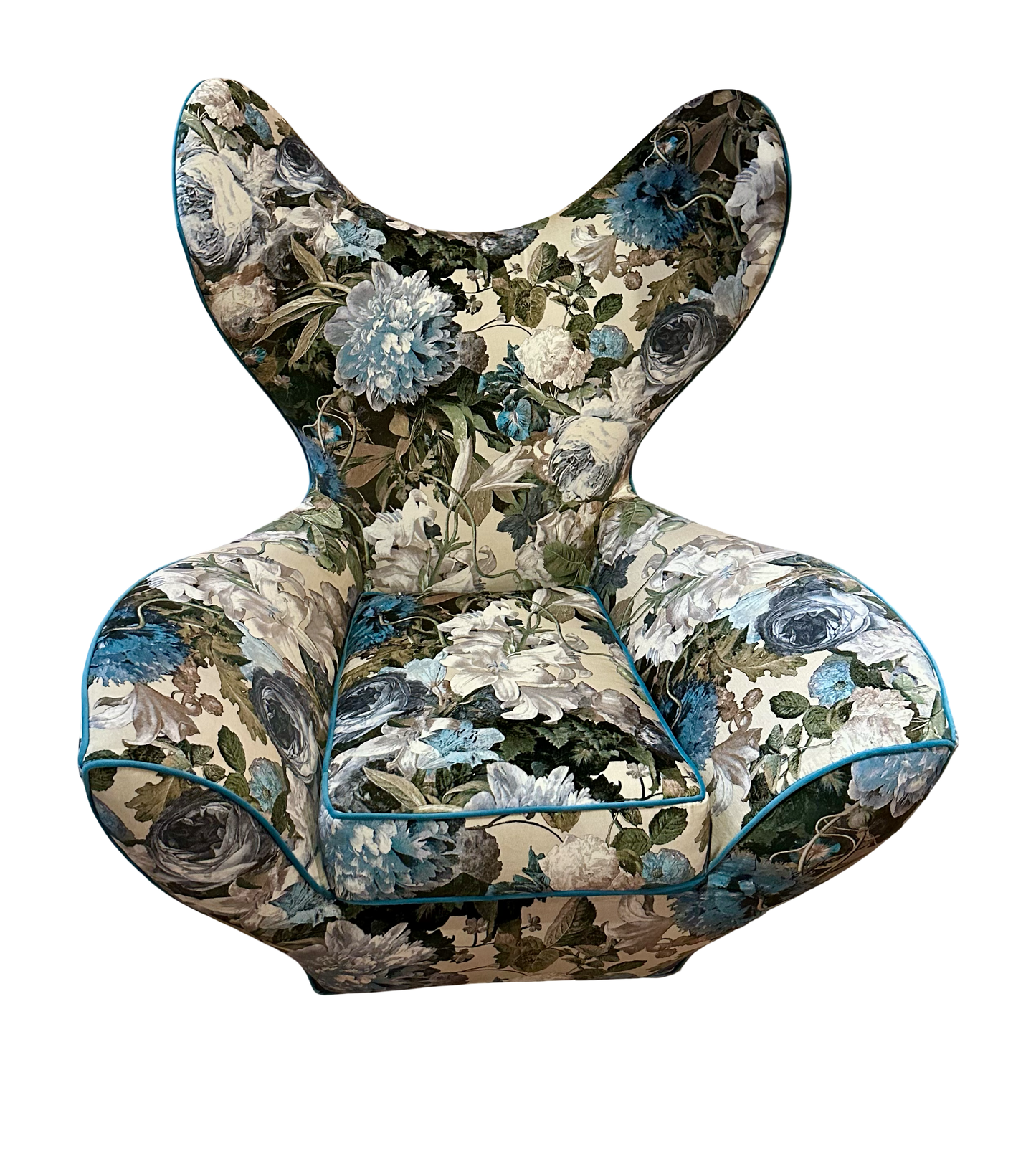 Elegant floral wing back chair by The Vault Creative featuring a classic design with floral upholstery and high winged sides.
