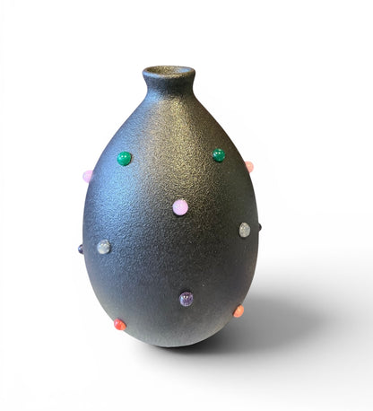 P. Grunsfeld Katie bud vase by The Vault Creative, featuring a sleek ceramic design with a narrow opening and modern aesthetic.
