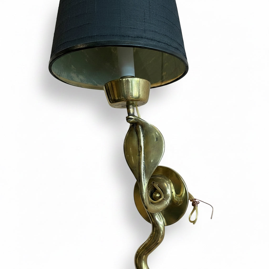 Pair of vintage brass snake sconces from The Vault Creative, featuring intricate snake design and antique brass finish.