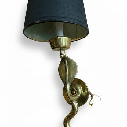 Pair of vintage brass snake sconces from The Vault Creative, featuring intricate snake design and antique brass finish.