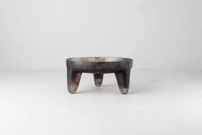 Saardé smoke-colored resin structured fruit bowl with a modern, textured design on a neutral surface.