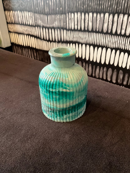 Emerald marble tabletop jar by Stone Textile Studio with a smooth, polished surface and elegant design.