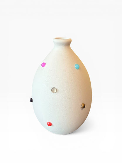 P. Grunsfeld Katie Bud Vase by The Vault Creative, ceramic with a sleek, modern design, displayed on a neutral background.