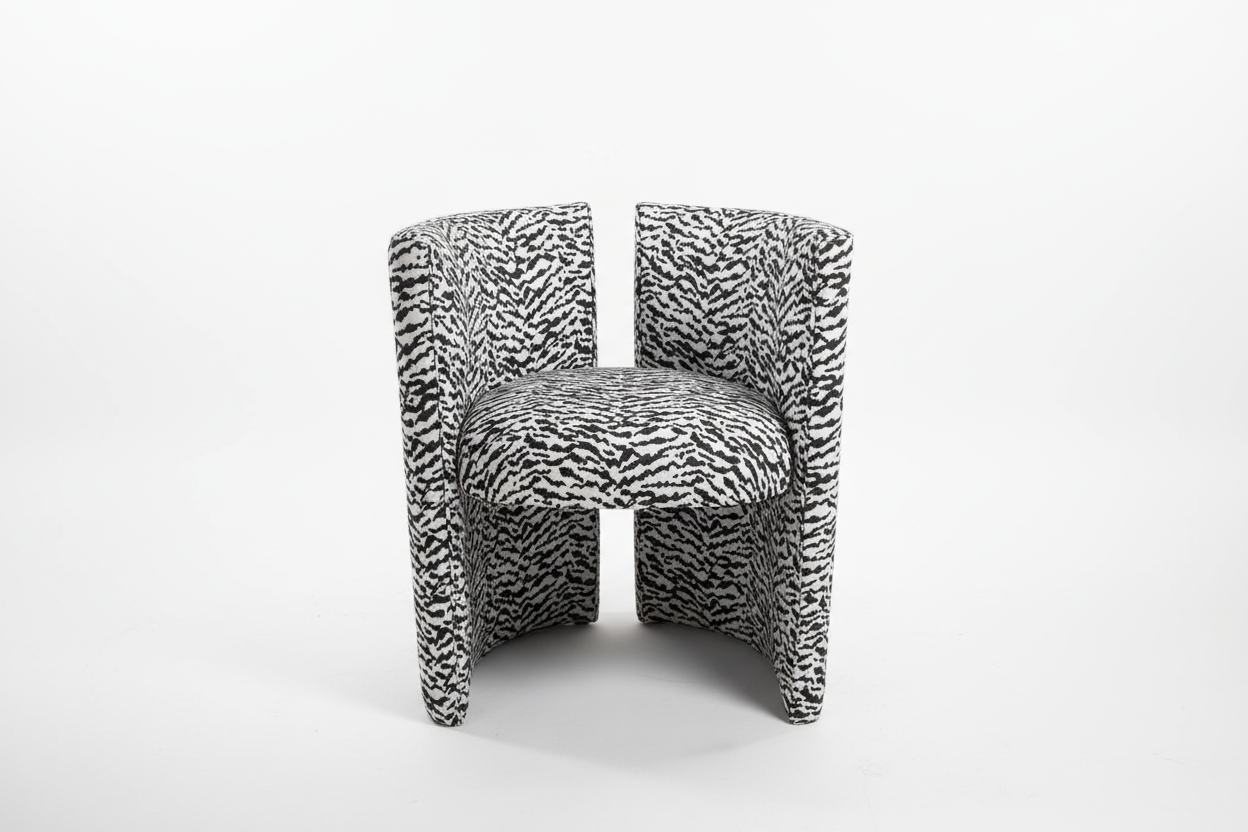 Black and white tiger print chair by The Vault Creative featuring a bold animal pattern and modern design.