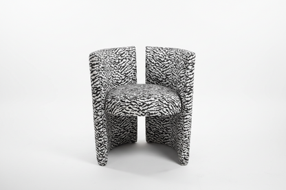 Black and white tiger print chair by The Vault Creative featuring a bold animal pattern and modern design.