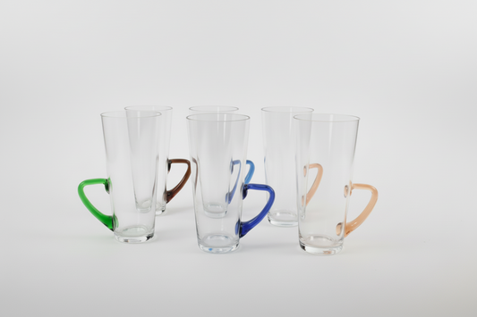 Vintage set of 6 glasses with assorted colored handles, by The Vault Creative, featuring clear glassware with vibrant handle colors.