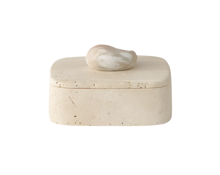 White stone box with a smaller stone on top against a white background