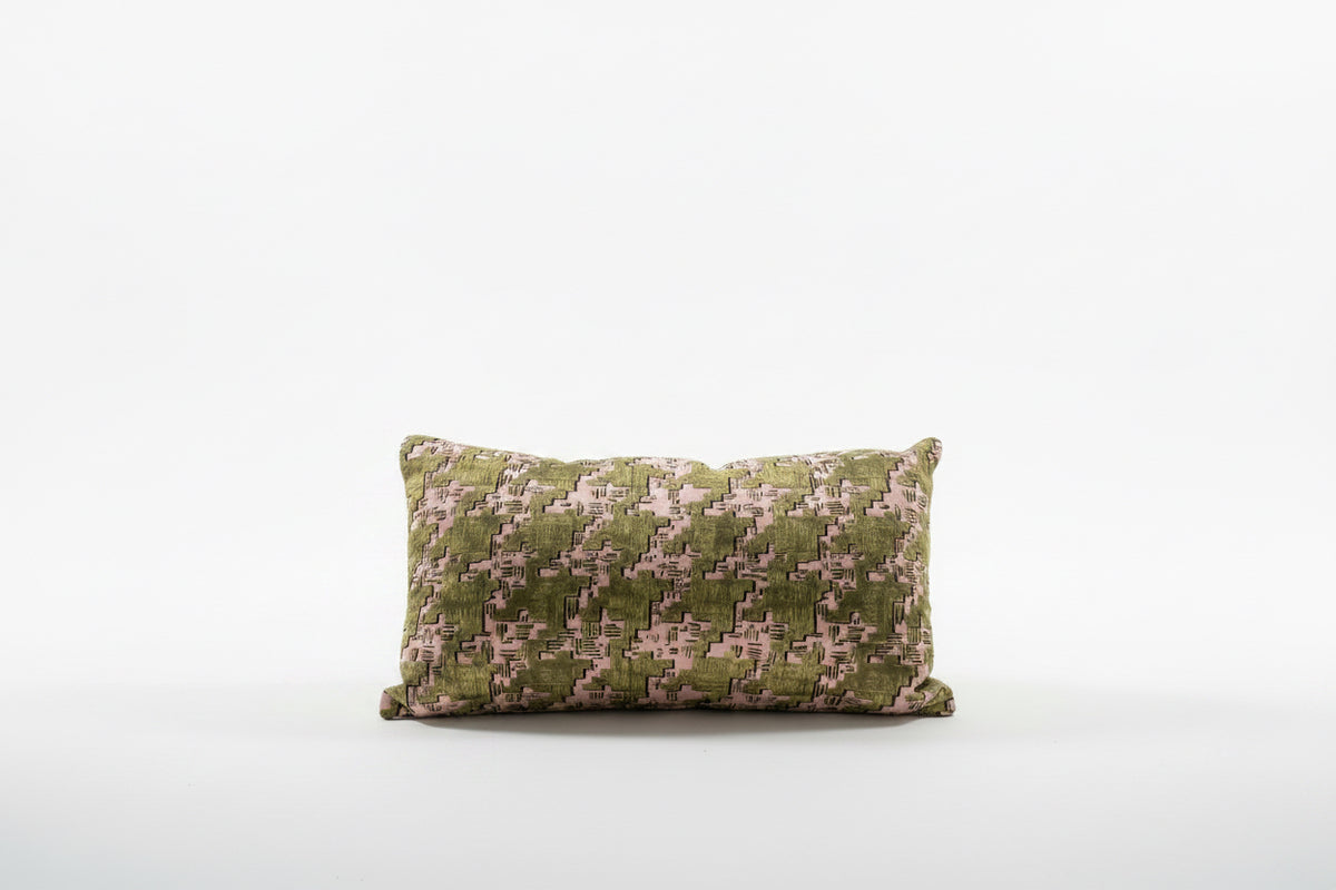 Small lumbar pillow by Stone Textile featuring soft fabric and ergonomic support for comfortable back relief.