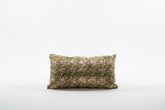 Small lumbar pillow by Stone Textile featuring soft fabric and ergonomic support for comfortable back relief.