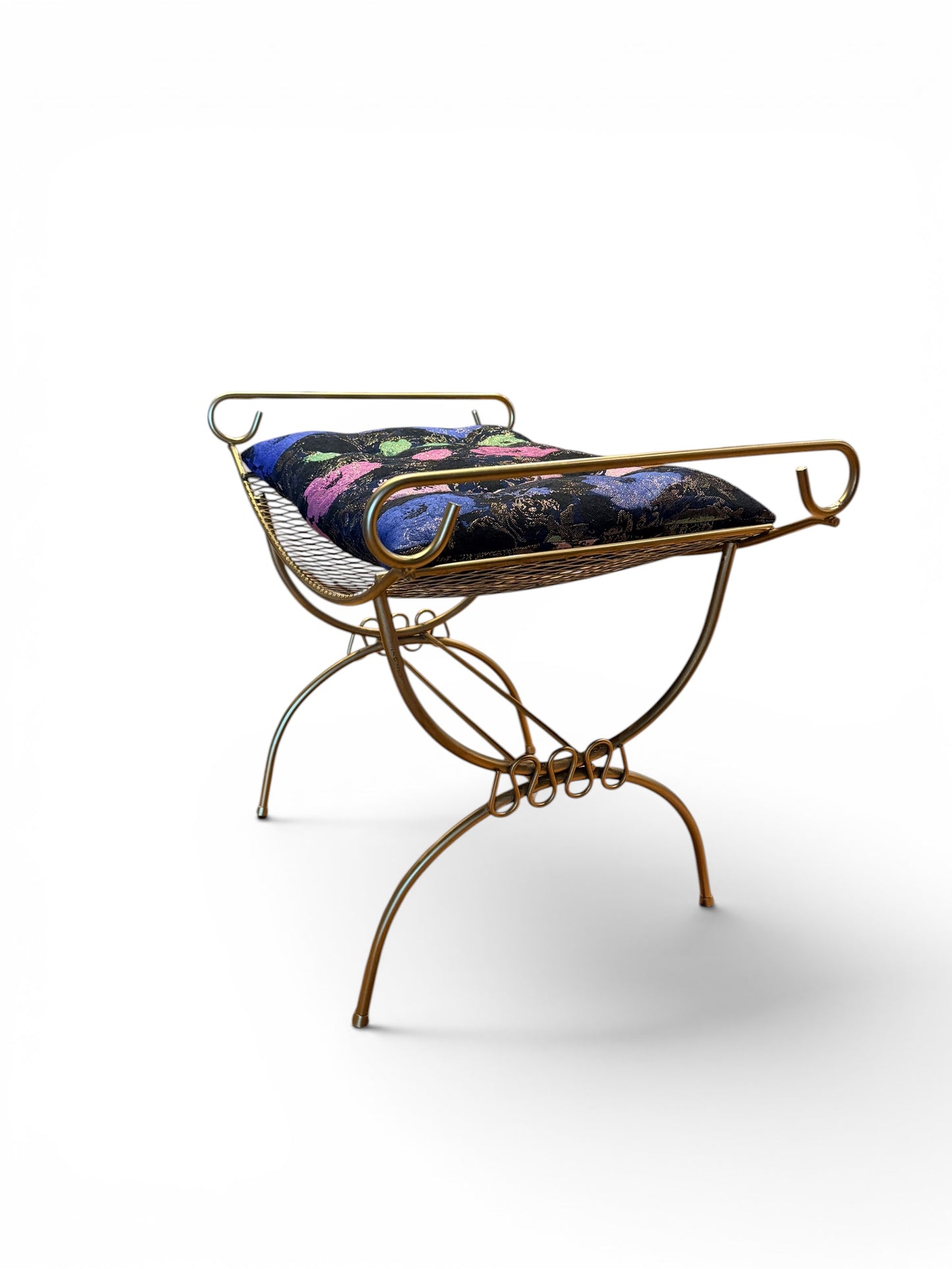 Vintage gold vanity bench by The Vault Creative with ornate legs and plush cushioned seat, perfect for classic dressing tables.