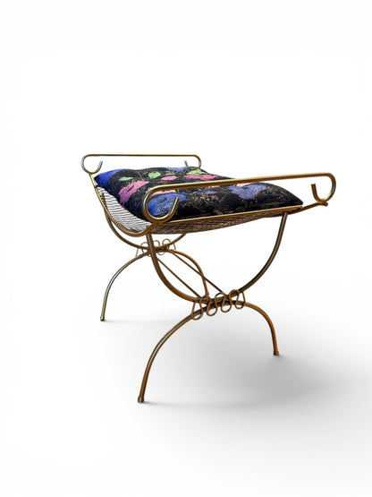 Vintage gold vanity bench by The Vault Creative with ornate legs and plush cushioned seat, perfect for classic dressing tables.
