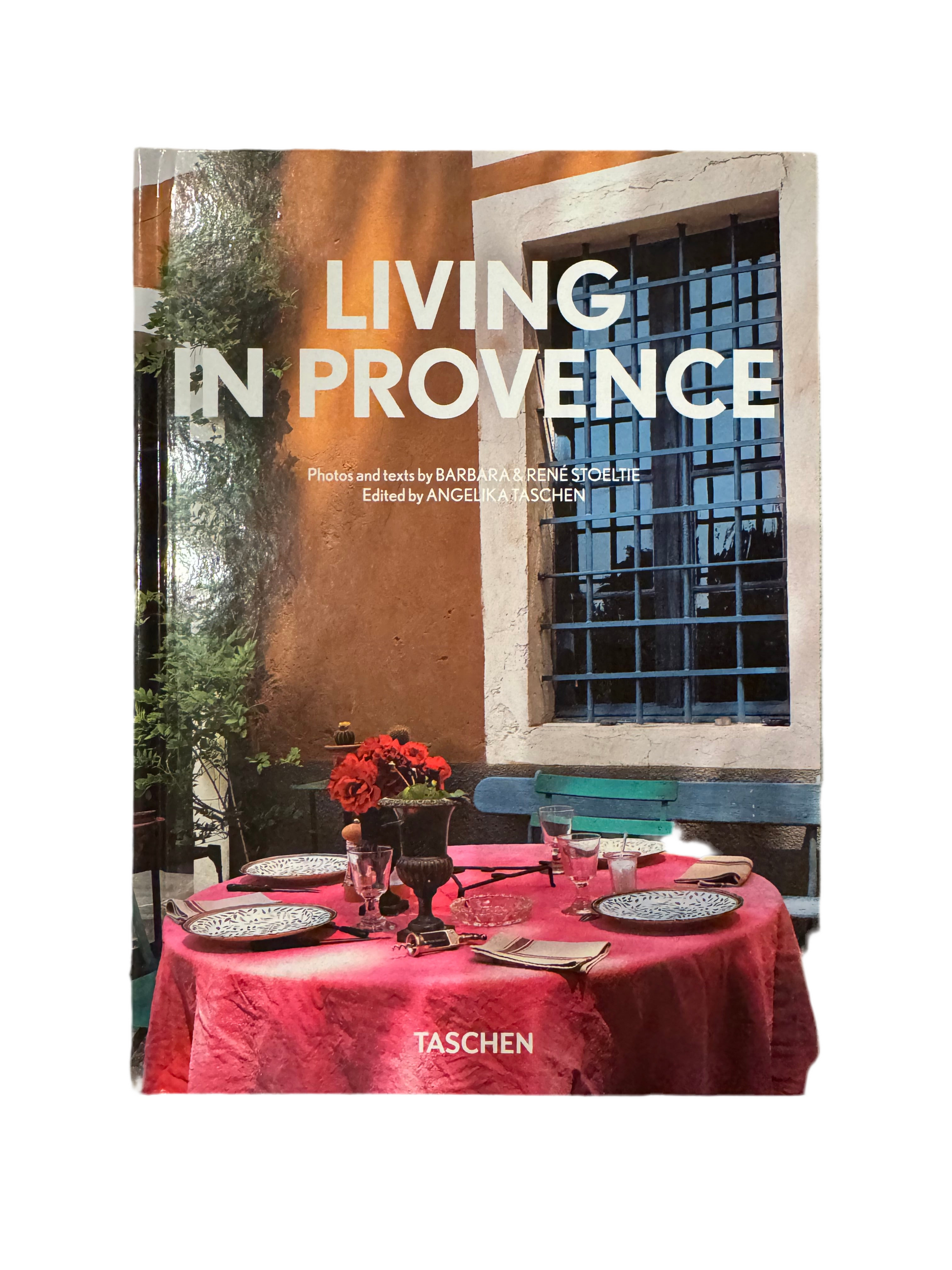 Living in Provence book by TASCHEN, 40th edition, featuring scenic images of Provence landscapes and charming countryside scenes.