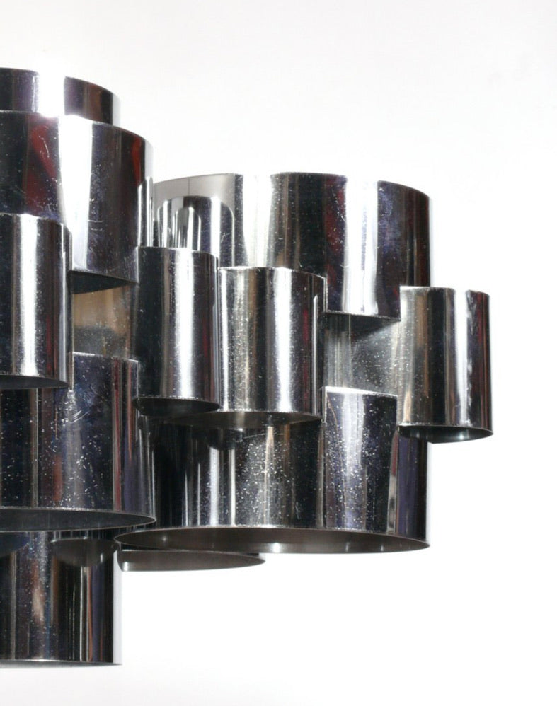 Chrome Cloud Chandelier by Ozmun Home featuring sleek, modern design with multiple hanging glass or crystal elements.