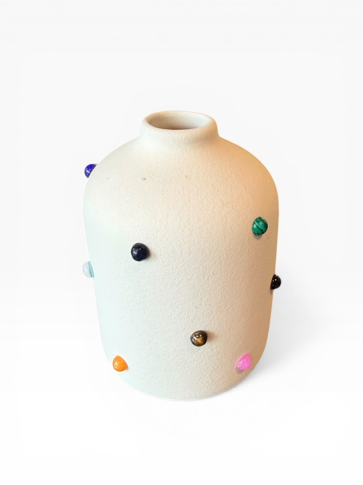 Phoebe P. Grunsfeld June Bud Vase with delicate floral design and smooth ceramic finish, perfect for displaying small flower arrangements.